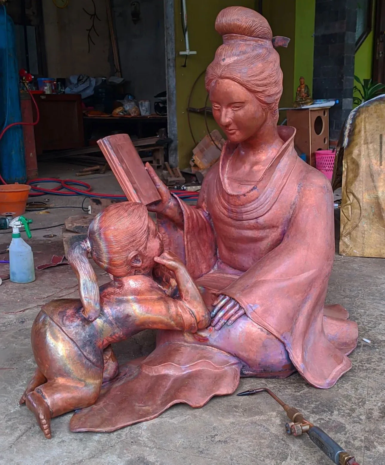 Copper Seating Statue